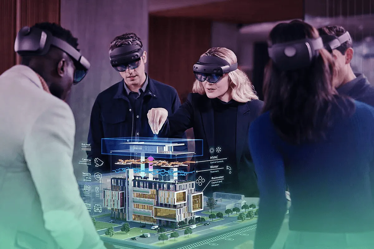 Team using AR headsets to visualize a detailed architectural model in mixed reality, demonstrating advanced 3D Walkthrough and design collaboration technology by Cloudzure.